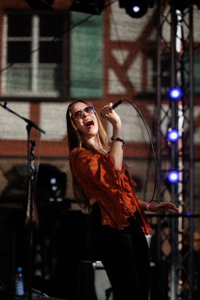 Crimson Roots vocalist performing live