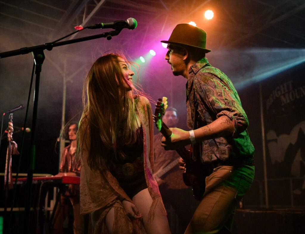 Crimson Roots vocalist and guitarist performing together