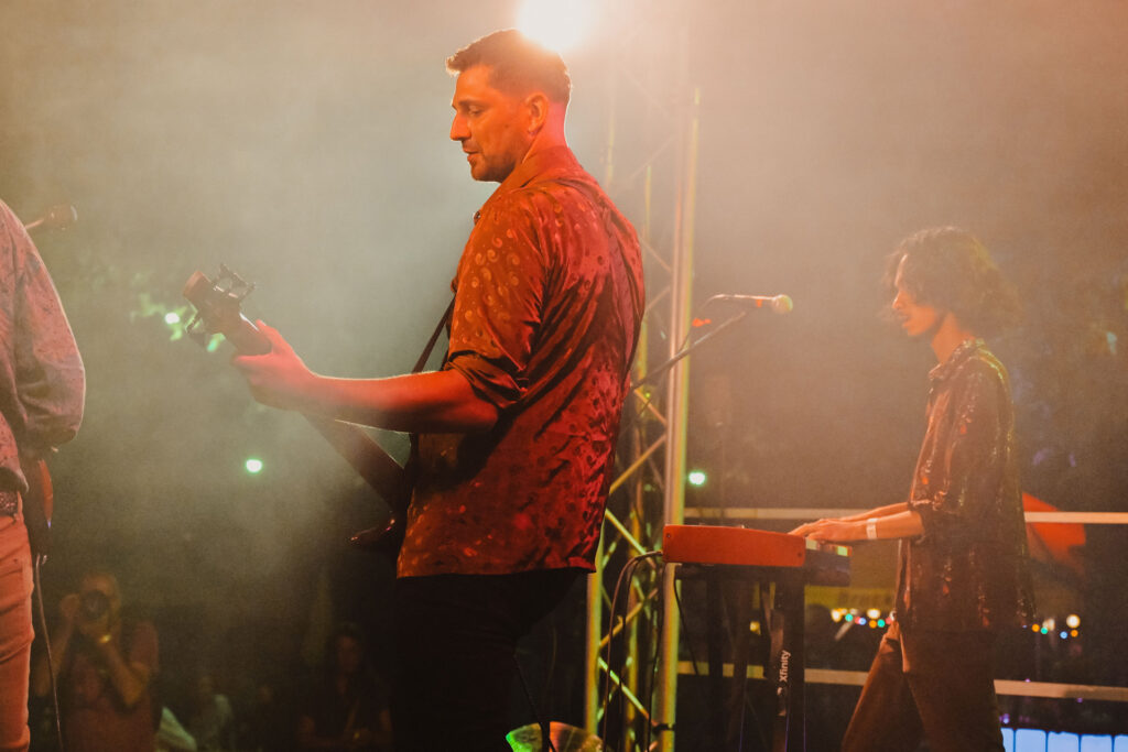 Crimson Roots musician performing live on stage