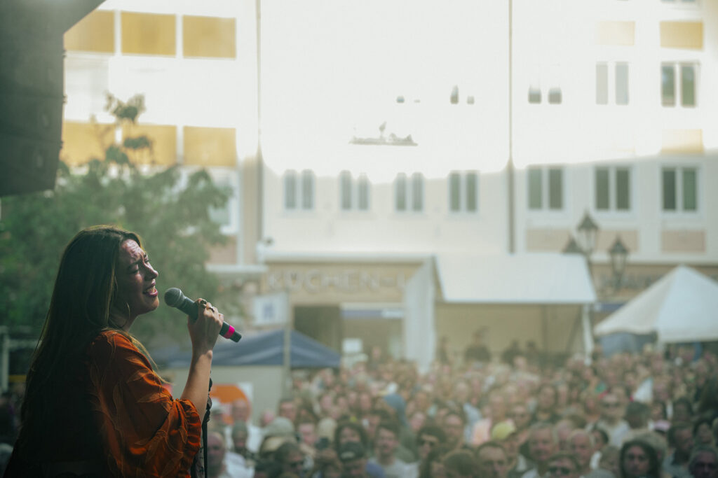 Crimson Roots performing at an outdoor concert