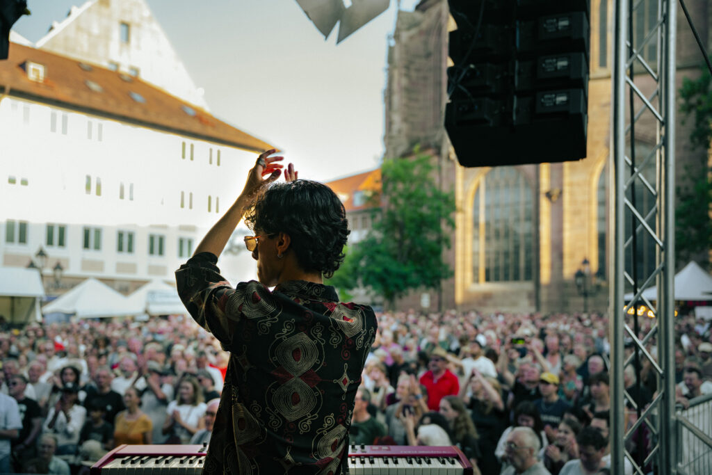 Crimson Roots performing at an outdoor concert